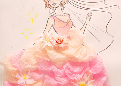 ドレスのイラストに花びらを貼った作品の画像